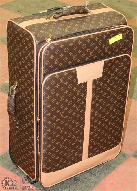 faux Louis Vuitton rolling luggage